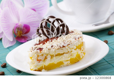 Dessert cake and coffee cup closeup photo 12300868