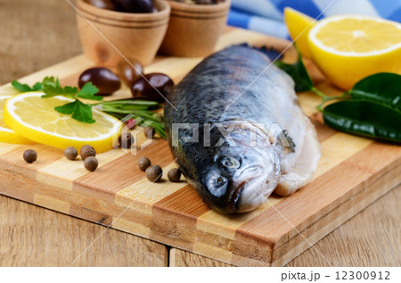 Raw trout on the board Raw trout on the board 12300912