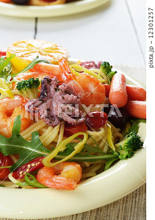Seafood spaghetti pasta dish with octopus and shrimps Seafood spaghetti pasta dish with octopus and shrimps 12301257