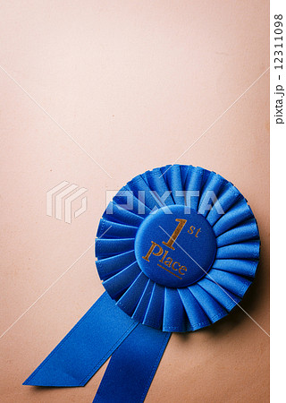 Blue first place winner rosette 12311098
