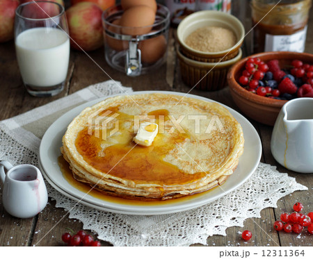 Pancakes with maple syrup Pancakes with maple syrup 12311364