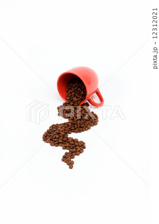 Flow beans from an overturned cup on a white background. 12312021