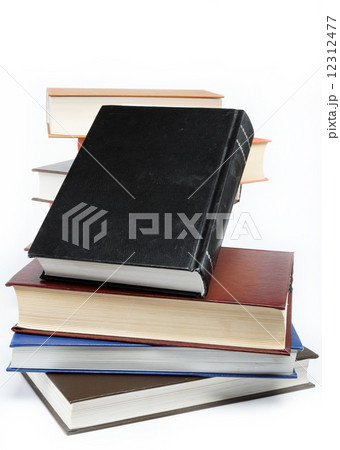 A stack of books on a white background. 12312477