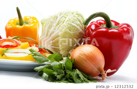 Healthy food. Fresh vegetables and salad on a white background. Healthy food. Fresh vegetables and salad on a white background. 12312532