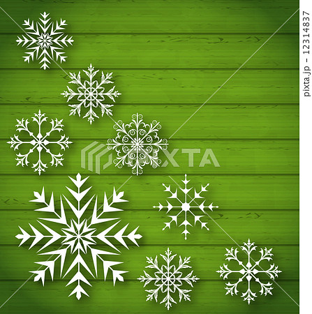 Set geometric snowflakes on wooden background Set geometric snowflakes on wooden background 12314837