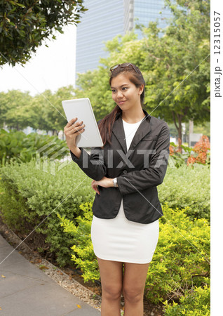Young businesswoman using a tablet. 12315057