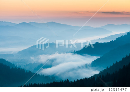 fog and cloud mountain valley landscape 12315477