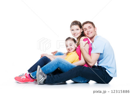 Happy young family with kid sitting. 12315886