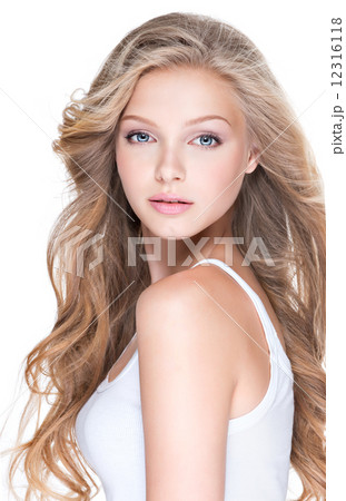 Beautiful young woman with long curly hair. 12316118