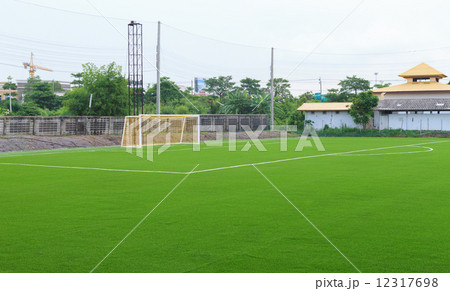 Artificial grass soccer field 12317698
