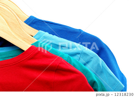 Fashion clothing on hangers at the show on white background. Fashion clothing on hangers at the show on white background. 12318230