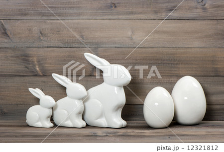 easter bunny family and white ceramic eggs 12321812