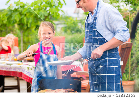 Barbecue with family in the garden 12332355