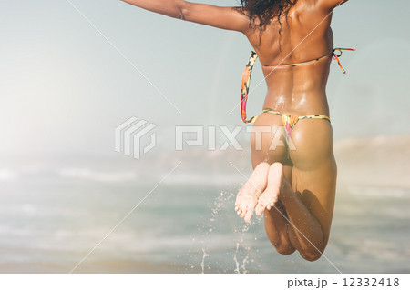 Woman on beach in summer vacation Woman on beach in summer vacation 12332418