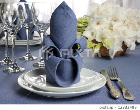 Napkin decorated with flower Napkin decorated with flower 12332499