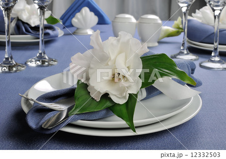 Napkin decorated with flower Napkin decorated with flower 12332503