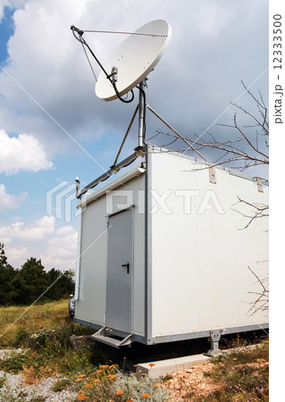 White satellite plate antenna of small observation station 12333500