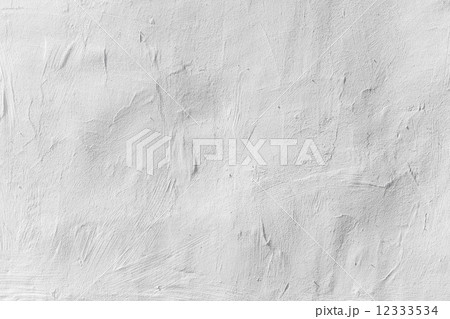Old white concrete wall with plaster, background photo texture 12333534