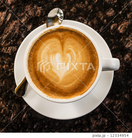 Coffee cup on marble table.Latte art heart shape. Coffee cup on marble table.Latte art heart shape. 12334954