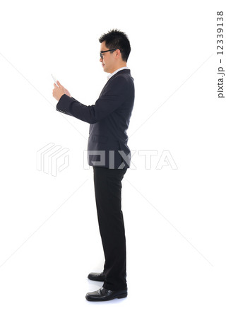 chinese business man using tablet 12339138