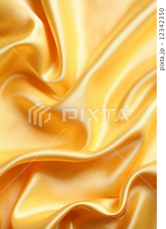 Smooth elegant golden satin as background 12342350