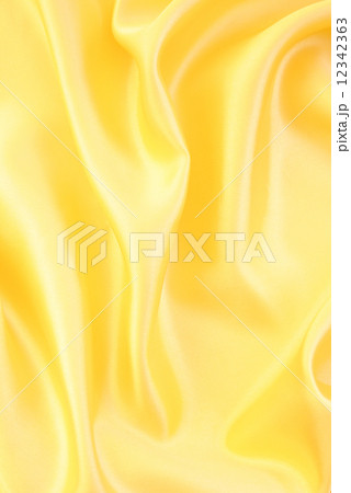 Smooth elegant golden silk as background Smooth elegant golden silk as background 12342363