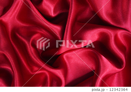 Smooth elegant red silk can use as background 12342364