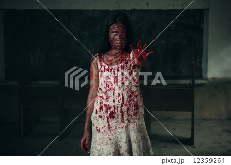 Suicidal girl in haunted school with cleaver 12359264