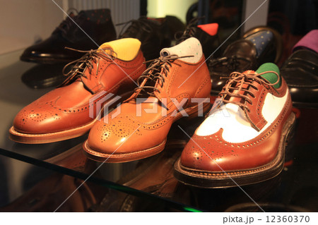 classic leather shoes in a shop 12360370