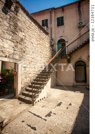 view of backyard with stone staircase at sunny day 12364731