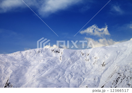 View on off-piste slope in early morning 12366517