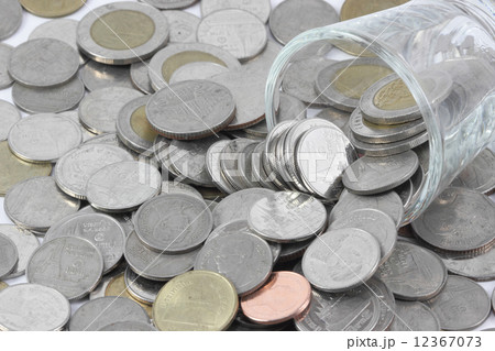 Coins over the glass be comparable to greed of human 12367073