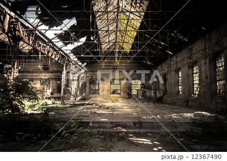 Abandoned industrial interior 12367490