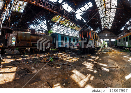 Old trains at abandoned train depot 12367997