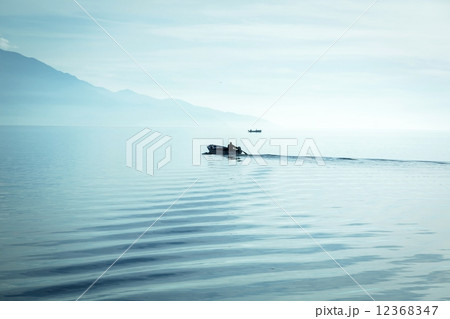 Boats at sunset 12368347