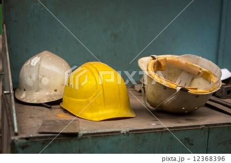 Dirty construction helmets 12368396