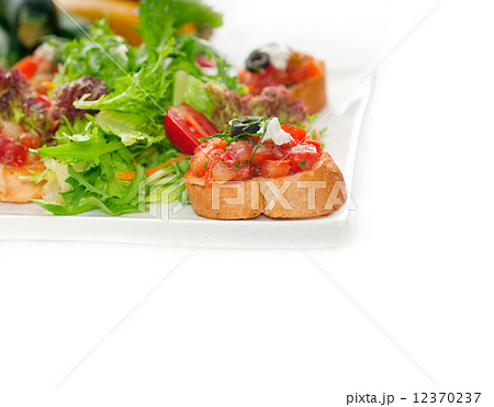 original Italian fresh bruschetta served with fresh salad and ve 12370237