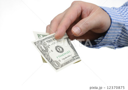 Giving one dollar bill 12370875