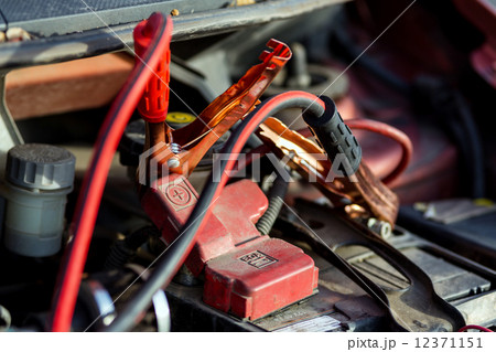 man repairing motor block 12371151
