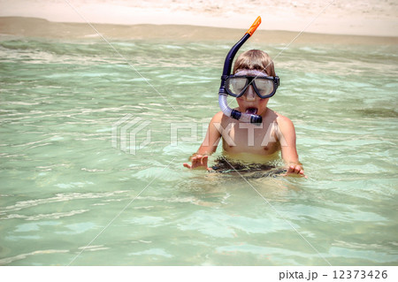 little boy snorkeling with an underwater mask on Koh Samui 12373426