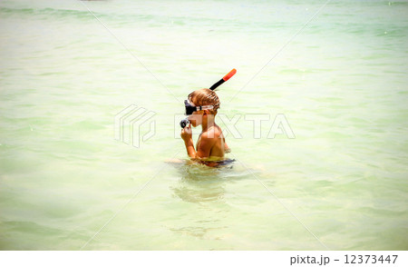 little boy snorkeling with an underwater mask on Koh Samui 12373447