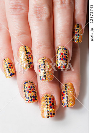 Female hands with nails art on the white background 12373745