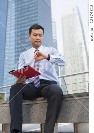 Business executive in a financial district.  12374812