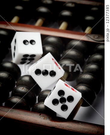 three dice on abacus are symbolic of gambling three dice on abacus are symbolic of gambling 12377385