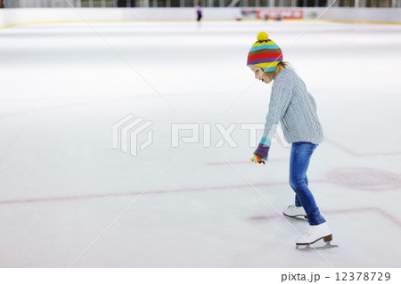 Little girl ice skating Little girl ice skating 12378729