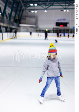 Little girl ice skating 12378738