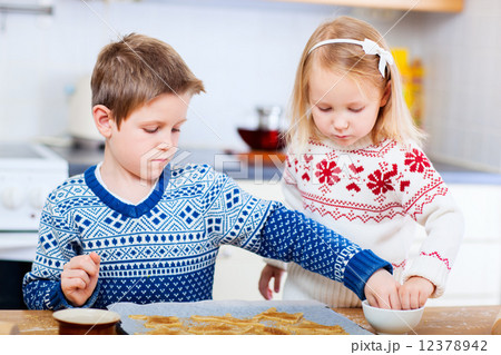 Kids baking cookies Kids baking cookies 12378942