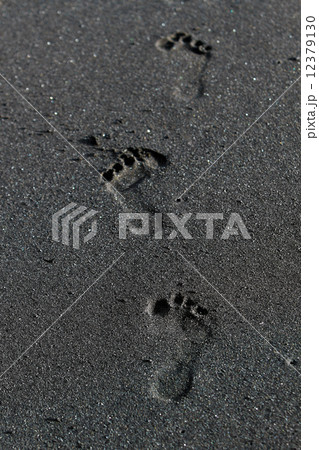 Footprints at beach Footprints at beach 12379130