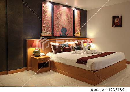 Beautiful bed in traditional Thai setting 12381394