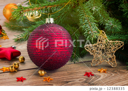 red ball decoration and fir tree red ball decoration and fir tree 12388335